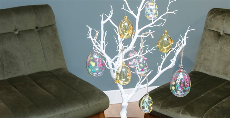 glass easter egg hangers on white mini tree