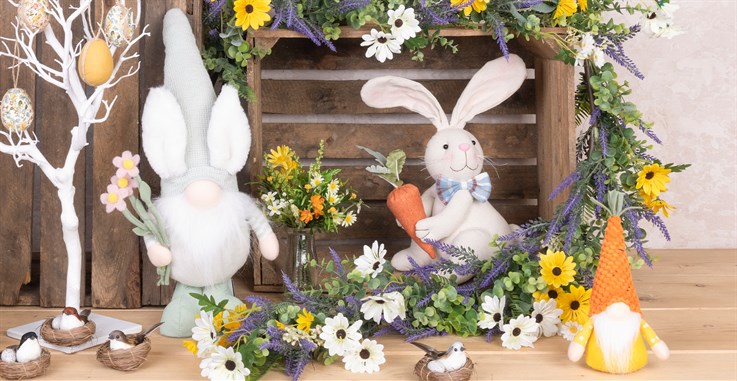 Springtime gonks and stuffed bunny rabbit decoration with flowers