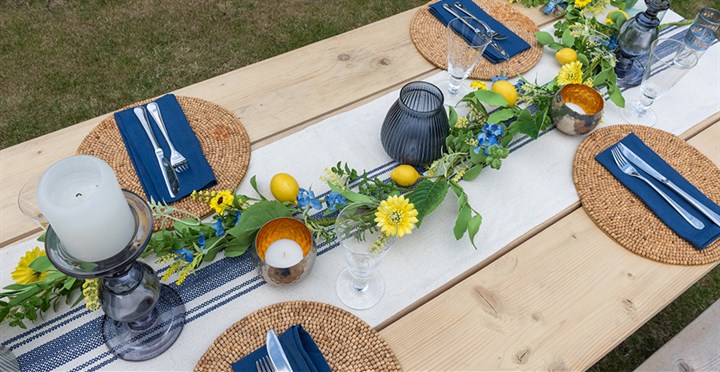 springtime dining table display with floral garland