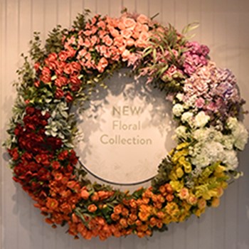 floral rainbow wreath display
