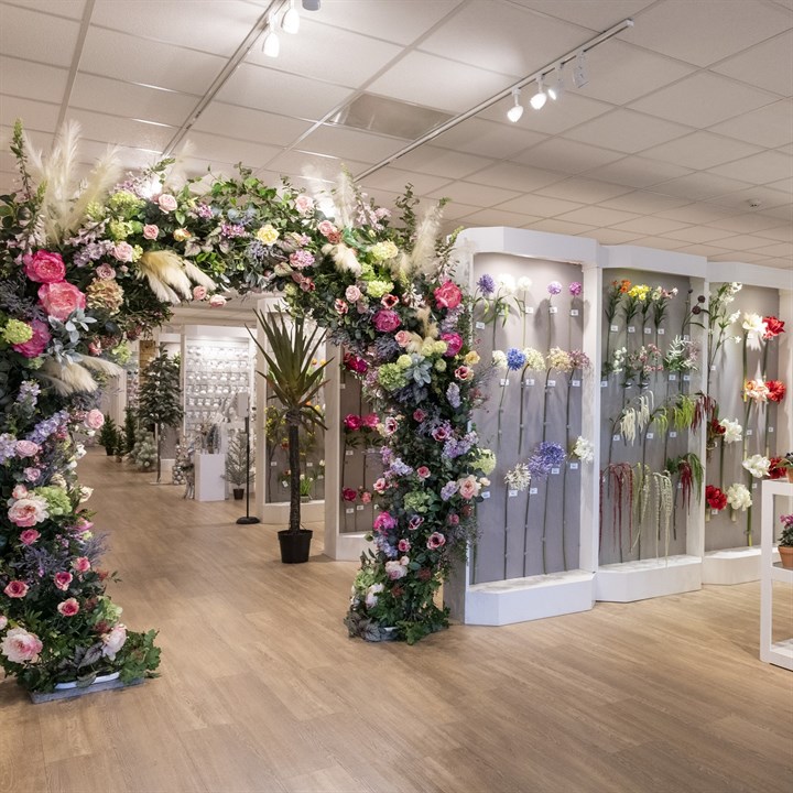 floralsilk trade showroom with floral archway 