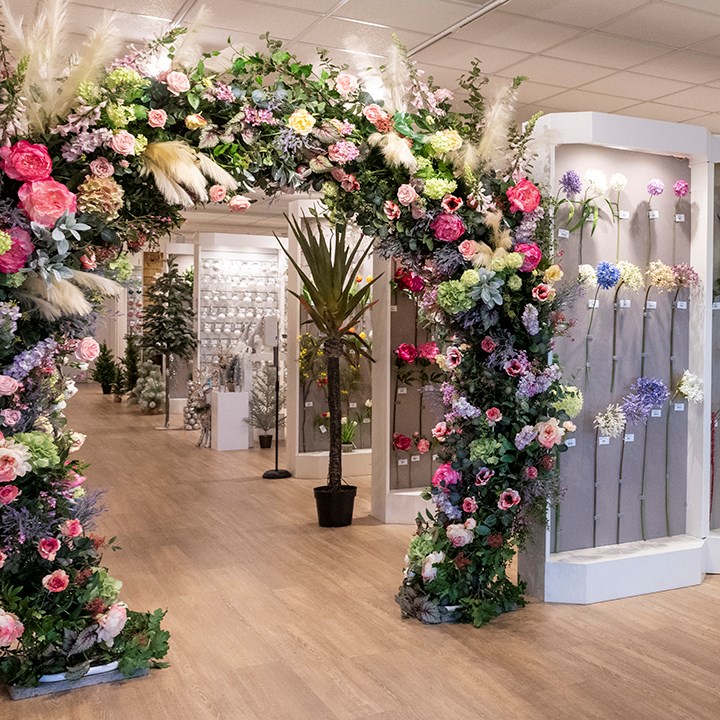 floral archway in floralsilk trade showroom