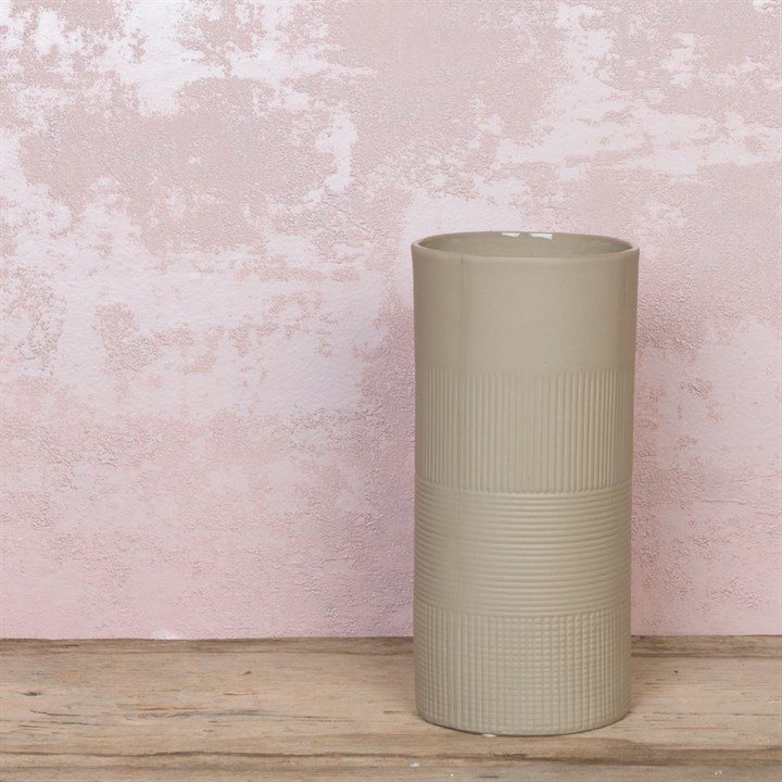 tall textured cylinder vase on white background