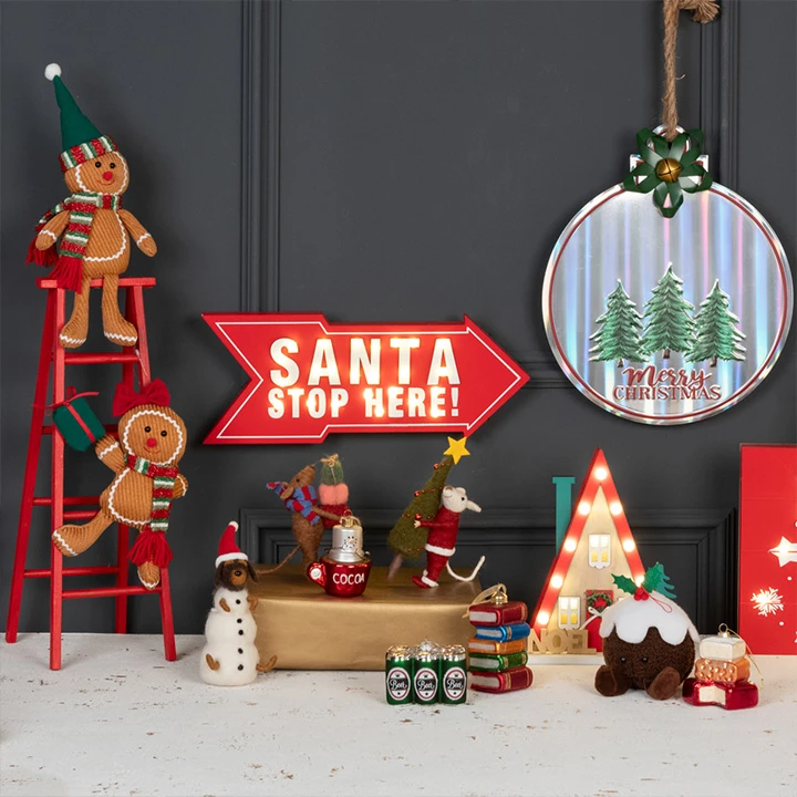 Bright fun decorations, including gingerbread men and a Santa Stop Here sign