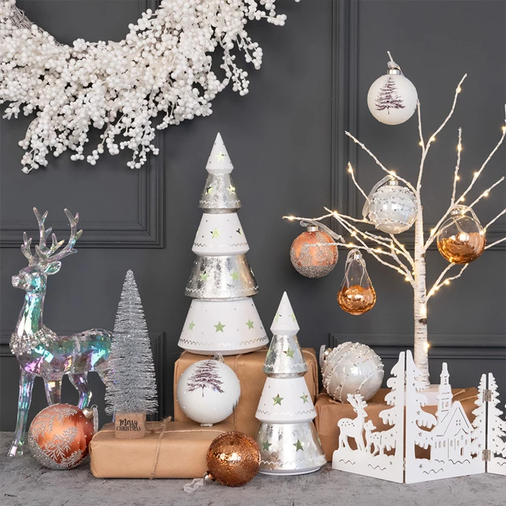 White Christmas decorations and a small xmas tree