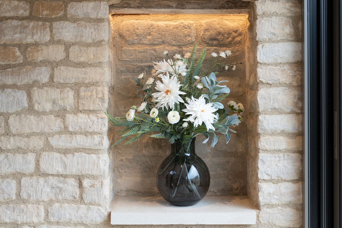 white faux dahlia bouquet arranged in vase